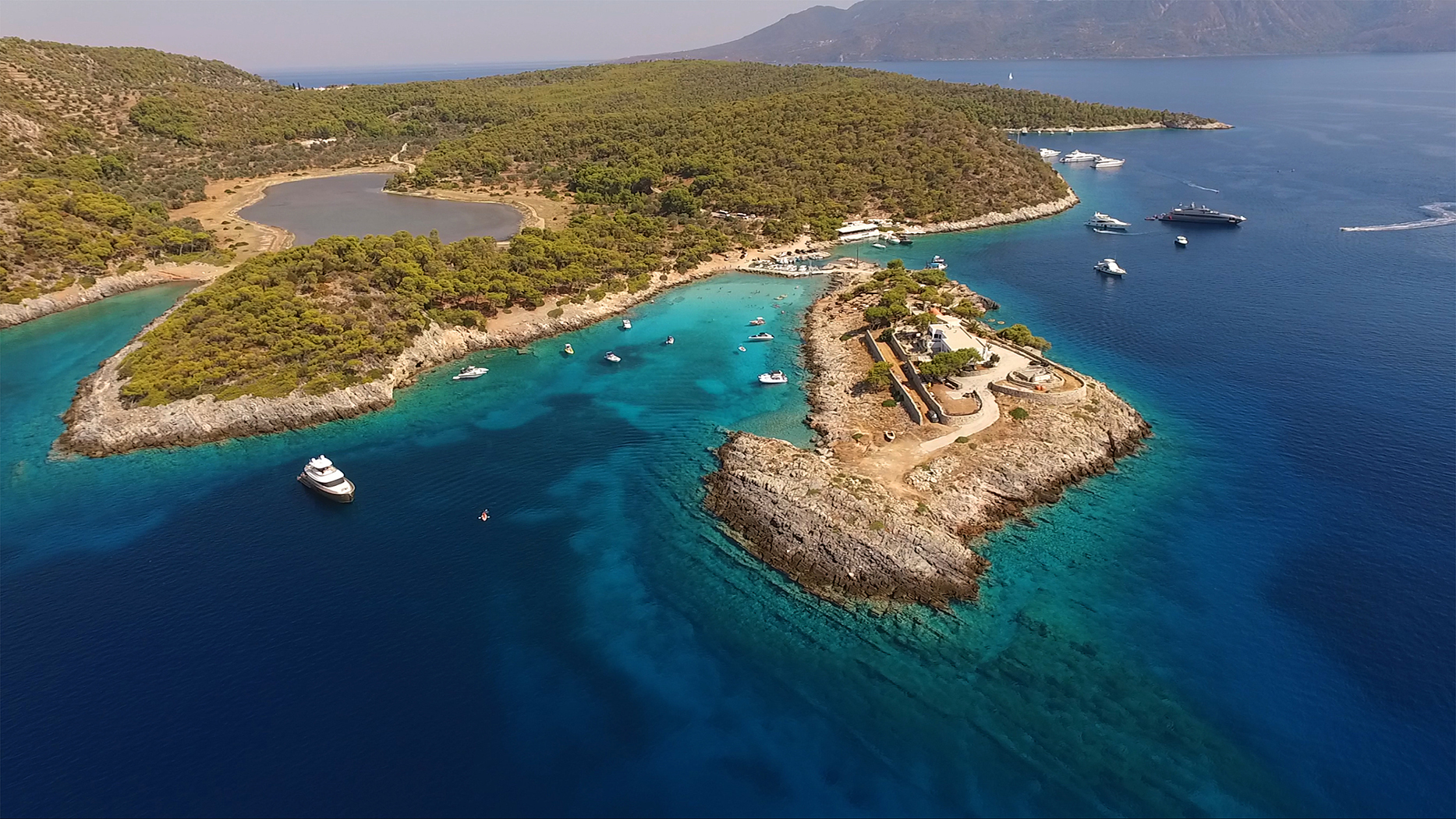 Explore the cove of Aponissos Beach